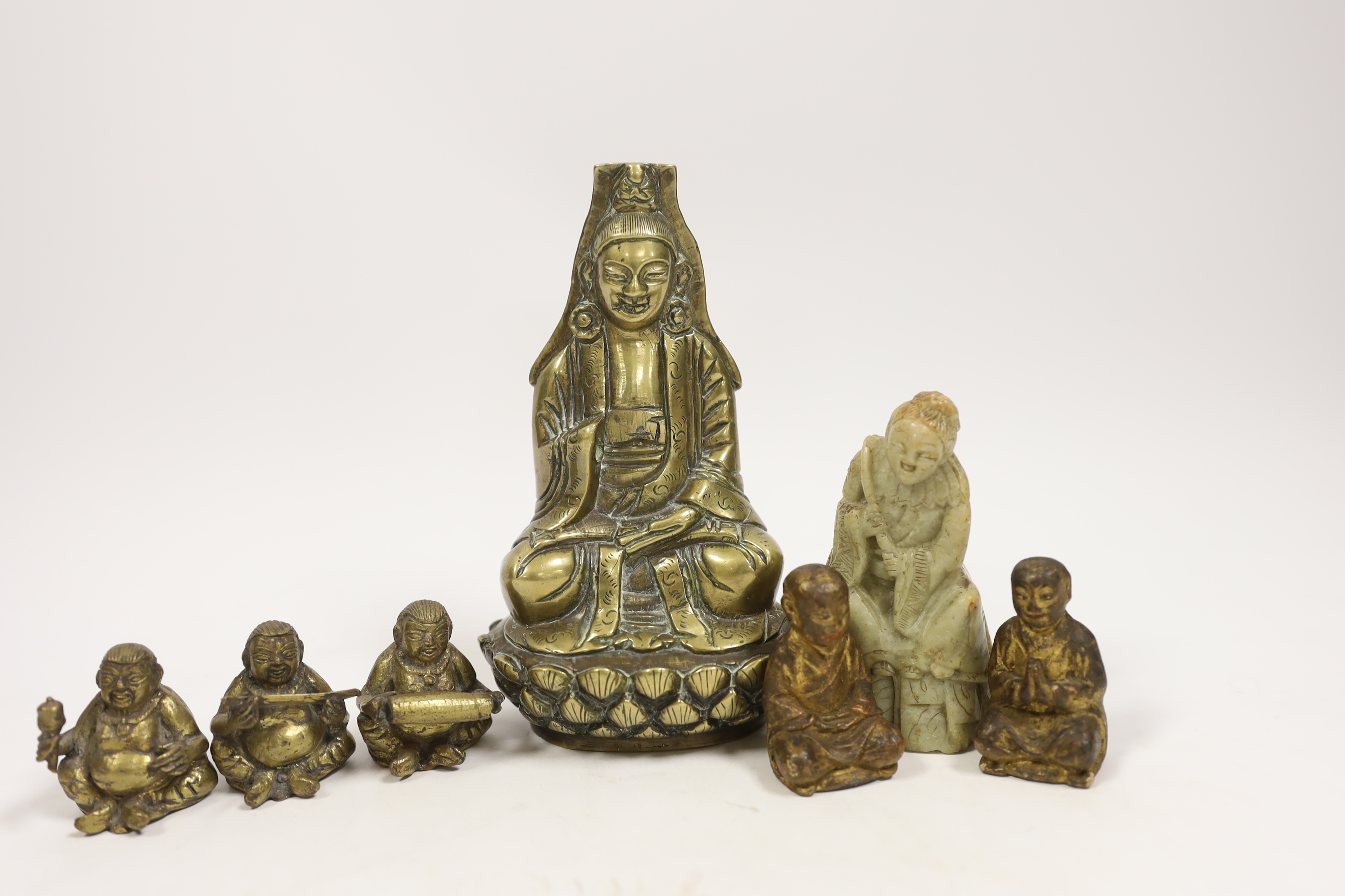 A Chinese bronze Buddha, a soapstone figure, etc, largest 15cm high